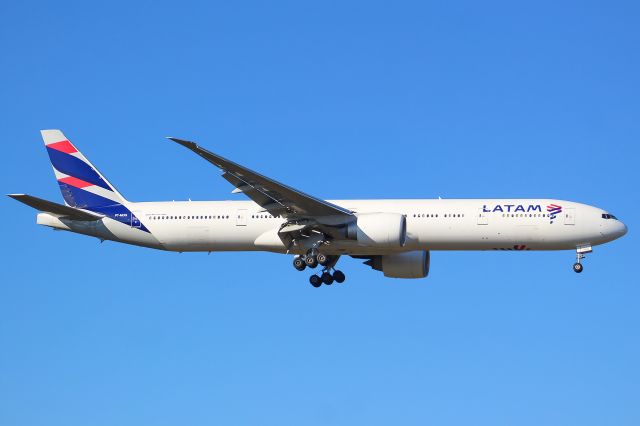 BOEING 777-300ER (PC-MUG) - A LATAM Brasil B777-300ER on final approach into Frankfurt Airport.br /br /Location: Viewpoint "West Runway"/Aussichtspunkt "Startbahn West".br /Date: 13.02.23 (dd/mm/yy).