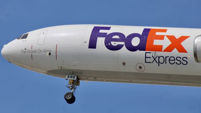 Boeing MD-11 (N599FE) - A FedEx MD-11F on short final at KIND. br /br /9/20/23