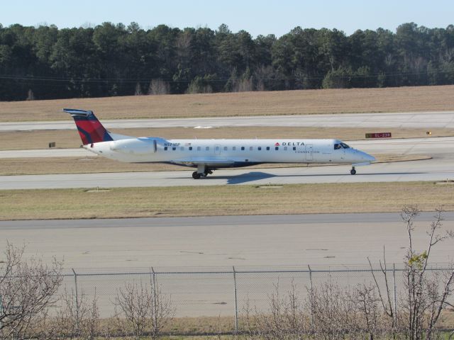 Embraer ERJ-145 (N571RP) - Delta Connection (Shuttle America) flight 5883 to Indianapolis Intl, an Embraer ERJ 145 taxiing to takeoff on runway 23R. This was taken January 30, 2016 at 3:39 PM.