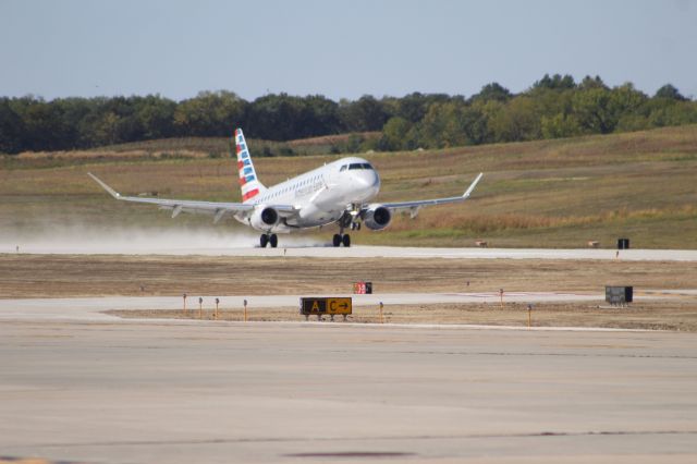 Embraer 175 (N205NN) - MHK was closed summer 2023 for runway construction (note the ample amounts of dust from the finished runway) and reopened on Sept 25 for commercial traffic. This is the moment of touch down!