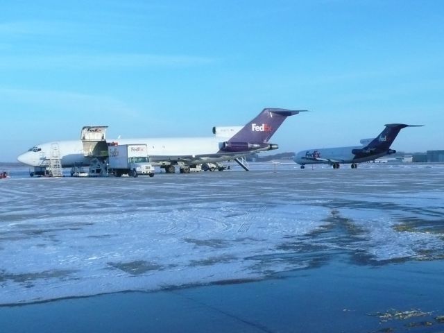 BOEING 727-200 (N492FE) - N493FE taxis past N492FE on last day of scheduled B727 service to KMSN for FedEx.