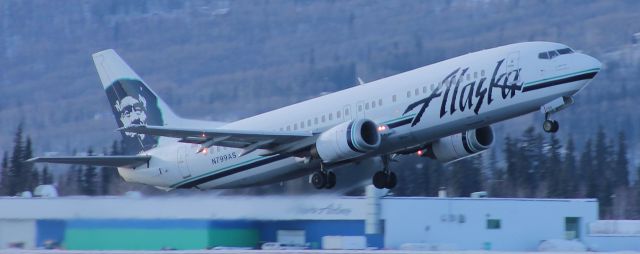 — — - 7374 Alaska Airlines climbing out.