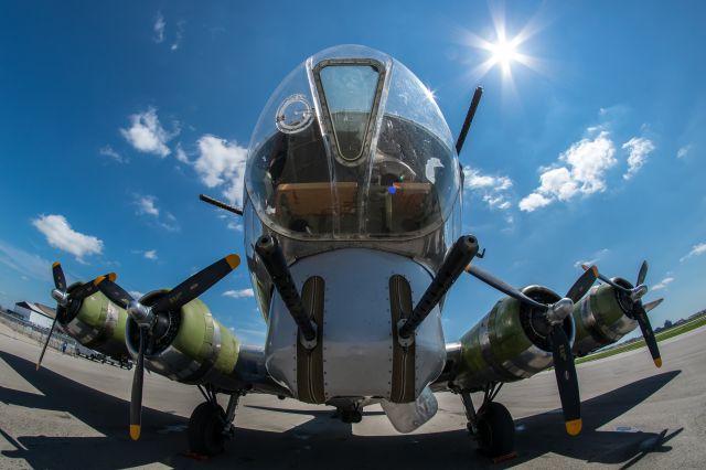 Boeing B-17 Flying Fortress (N3701G) - Madras Maiden basking in the summer sunshine.  This was taken with a Rokinon 8mm fisheye lens.