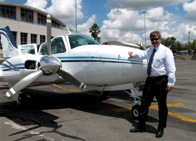 Beechcraft Baron (58) (ZS-MDJ) - Landaed at Lanseria, South Africa.