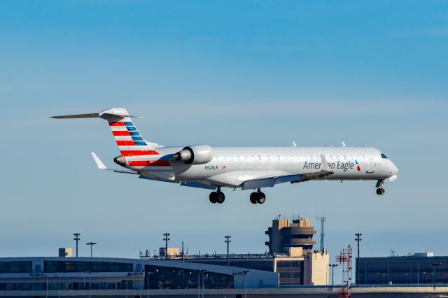 Canadair Regional Jet CRJ-900 (N249LR) - Mesa Airlines CRJ900 landing at DFW on 12/27/22. Taken with a Canon R7 and Tamron 70-200 G2 lens.
