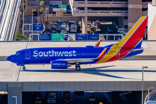 Boeing 737-700 (N7884G) - A Southwest 737-700 taxiing at PHX on 2/9/23 during the Super Bowl rush. Taken with a Canon R7 and Tamron 70-200 G2 lens.