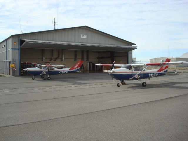 Cessna Skylane (N490CP) - Two on the ramp at Utah CAP Wing Headquarters.