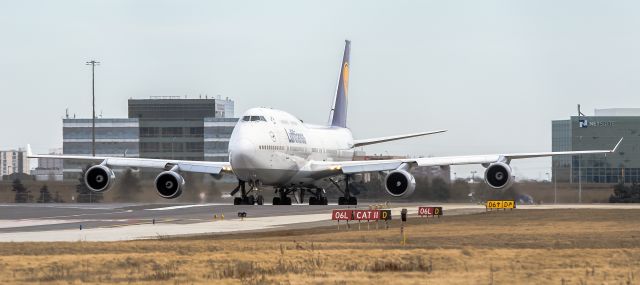 Boeing 747-200 (D-ABVK) - Lufthansa 747-400 D-ABVK landed at Toronto YYZ use up the full length of runway to slow down and taxi back to terminal.