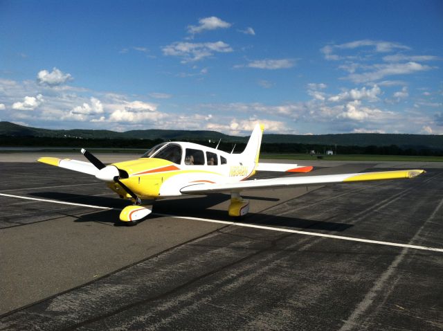 Piper Cherokee (N8342N) - PA-28-181 at Reading Airport, just after its new paint job.