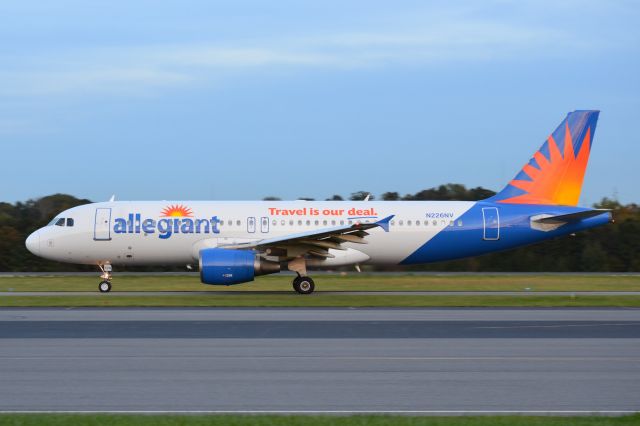 Airbus A320 (N226NV) - Taxiing at KJQF at dusk - 10/23/18