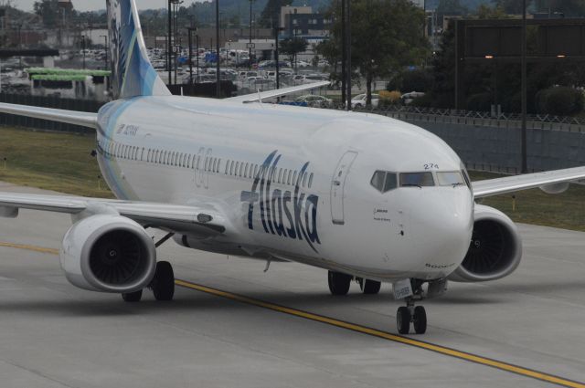 Boeing 737-900 — - Alaska Airlines flight 718 is pulling into Gate A9 at 3:33 PM CDT.  This flight was flown on what was then Alaskas newest aircraft.  Photo taken July 28, 2017 with Nikon D3200 mounting 55-200mm VR2 lens.