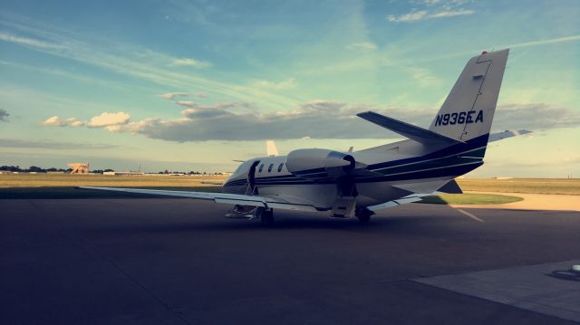 Cessna Citation Excel/XLS (N936EA) - Citation XLS at a hangar on the Northeast side of IND on a warm summer day.
