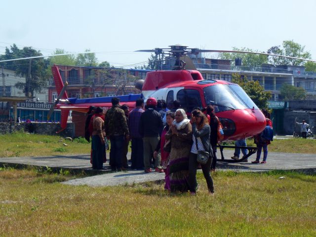 Eurocopter Super Puma (EC-225) (9N-AKA) - This chopper was busy bringing bodies of Plane Crash of Yeti Airlines in bound to Jomsom from Pokhara in 2015. People gathers to identify their beloved ones in Gandaki Hospital helipad in Pokhara. 