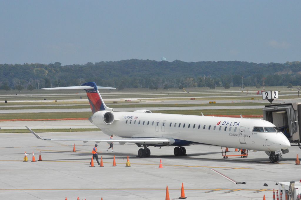 Canadair Regional Jet CRJ-900 (N299PQ) - 2 hours and 17 minutes late, Delta Connection (Flagship) 381 arriving from Detroit at 3:07 PM CDT.   Taken August 11, 2016 at OMA with Nikon D3200 mounting 55-200mm lens.  