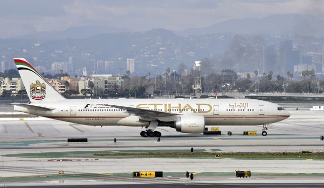 BOEING 777-200LR (A6-LRE) - Taxiing to gate at LAX