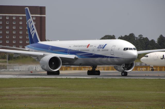 BOEING 777-300 (JA786A) - Departure at Narita Intl Airport R/W16R on 2011/5/4 Forward together as one Japan Title