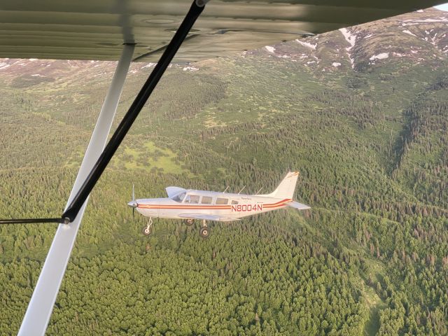 Piper Saratoga (N8004N) - in air photo of N8004N
