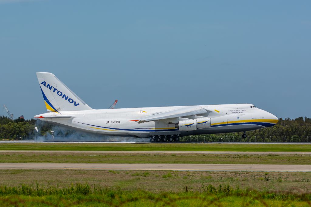 Antonov An-12 (UR-82029) - UR-82029 stops in Brisbane for an overnight stay before departing to Honolulu, within its cargo bay, two ex-RAAF FA-18s relocating from Australia to Canada. 18thNov2020 YBBN R19L