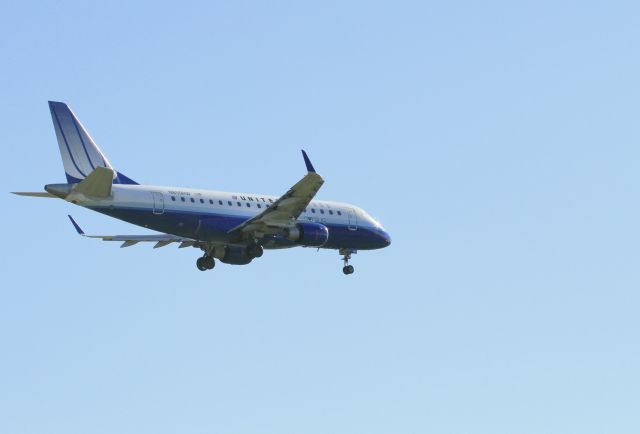 N855RW — - A United Shuttle America Embraer 170SE N855RW on approach to Chicago O' Hare. I took this photo from our rental car. I don't live close to a big airport, so I have to take the photos on trips.