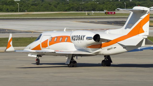 Learjet 31 (N239AY) - Nice looking Learjet! Taxiing for departure 13R