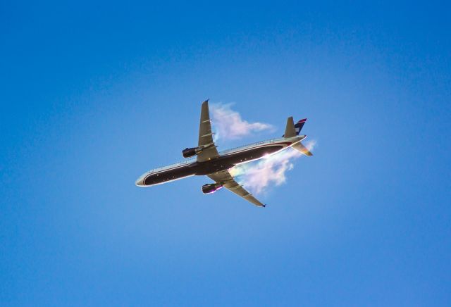 Airbus A321 — - Captured on 02/09/2015 standing on Kaiser Airs ramp. This plane had departed SFO and was flying over KOAK.