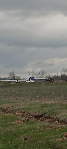 N21067 — - This is the aftermath of an F2 tornado that came through Columbus Indiana.And took out the barn.This plane was being stored in.