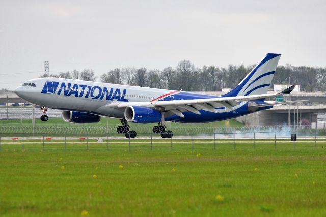 Airbus A330-200 (N819CA) - Arriving 5-L on 05-04-22 from SKB upon completion of it's first flight since damaging the wing-tip leading edge slat smacking it up against a light post when parking on 05-01-22