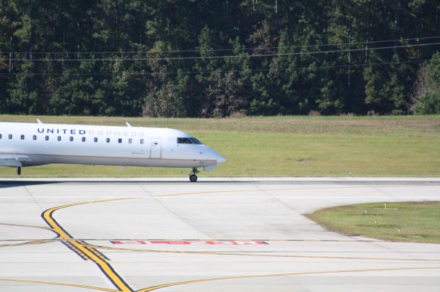 Canadair Regional Jet CRJ-700 (N515MJ) - 515MJ on landing rollout rwy 5L at RDU