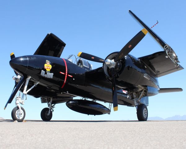 N805MB — - Not one, but TWO Grumman F7F-3s came through Las Cruces en route to Reno.  This is formerly "Bossman" and is now sporting the "El Jefe" scheme.  I had an amazing opportunity to take a few pictures of both of the F7Fs on the ramp this day, but this one is by far one of the best photos I have ever shot.