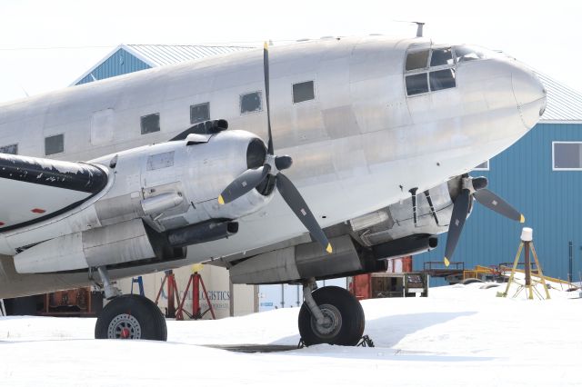 CURTISS Commando (C-GIBX) - Curtiss C-46F Commandobr /Initially USAAF 44-78649 in 1945, this aircraft has a long and varied history. Transport Canada Certificate of Registration was cancelled in 2010. It is now stored at YGM still wearing C-GIBX and the minimalist livery of First Nations Transportation, a company that until 2009, serviced First Nations east of Lake Winnipeg.