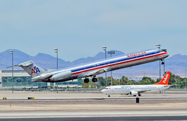 McDonnell Douglas MD-83 (N438AA) - N438AA American Airlines 1987 McDonnell Douglas MD-83 - cn 49456 / ln 1393  -  C-FANB Air North 1992 Boeing 737-48E - cn 25764 / ln 2314 - Las Vegas - McCarran International Airport (LAS / KLAS)br /USA - Nevada, June 20, 2014br /Photo: Tomás Del Coro