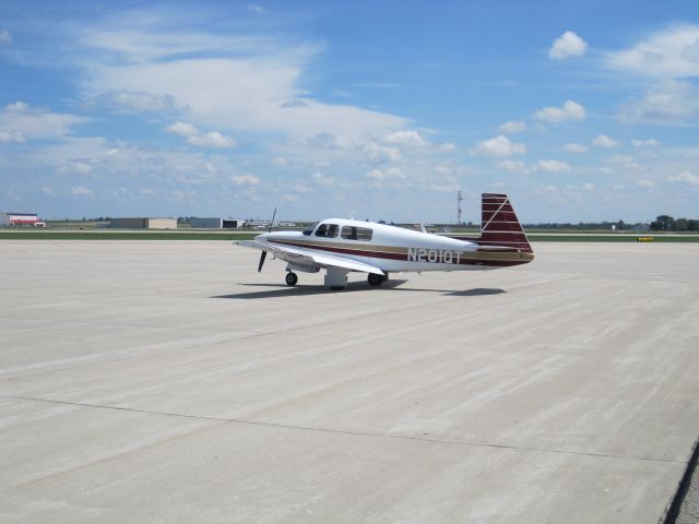 Mooney M-20 (N201QT) - Outside on the ramp in front of Kealys restaurant in Janesville, WI.  On the way to Oshkosh 2010.