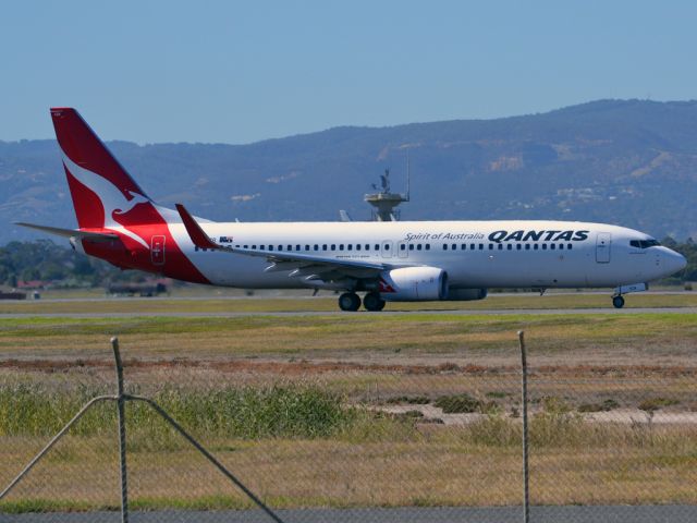 Boeing 737-800 (VH-VZB) - On taxi-way heading for take off on runway 05. Thursday 12th April 2012.