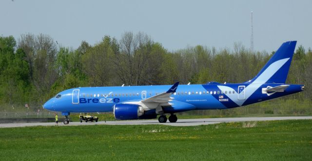 Airbus A220-300 (N219BZ) - Taxiing to parking is this 2023 Breeze Airways Airbus 220-300 in the Spring of 2025.
