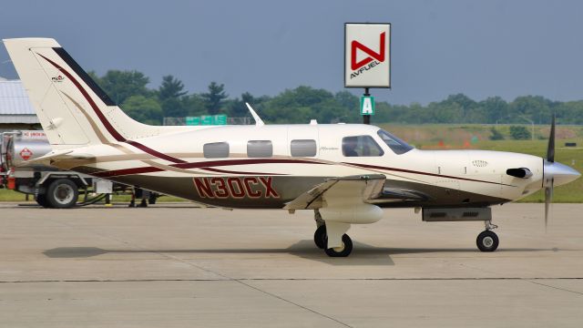 Piper Malibu Meridian (N30CX) - The resident turbine Malibu taxiing away from the FBO enroute to Indy. br /br /N30CX. 2008 Piper PA46-500TP Malibu Meridian. Private. KVPZ. 6/18/23. 