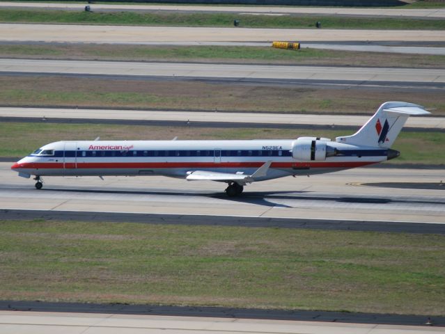 Canadair Regional Jet CRJ-700 (N529EA) - Arriving runway 8L - 4/6/13