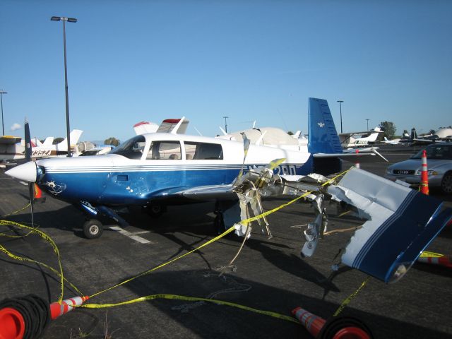 Mooney M-20 Turbo (N202BD) - what happens when you park your plane across from a run-away plane with a spinning prop.