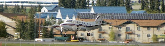 Beechcraft Super King Air 200 — - She was floating down the runway.
