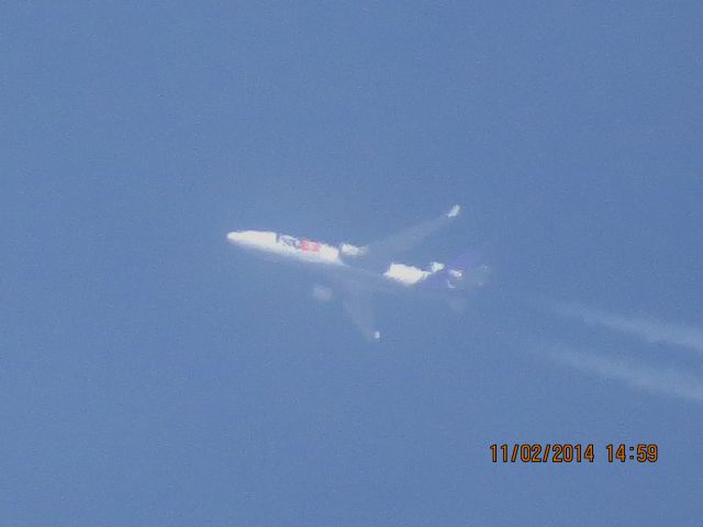 Boeing MD-11 (N586FE) - FedEx flight 507 from MEM to SEA over Southeastern Kansas at 38,000 feet.