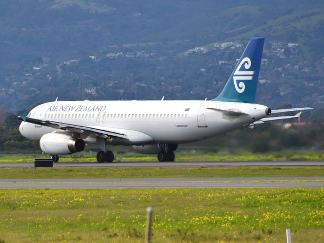 Airbus A320 (ZK-OJI) - Rolling for take off on runway 05, for flight home to Auckland, New Zealand. Thursday 12th July 2012.