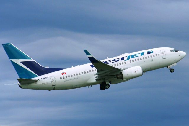 Boeing 737-700 (CFWSV220) - Taking off in the early morning