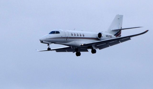 Cessna Citation Latitude (N521QS) - On final is thie 2016 Cessna Citation Latitude     in the Winter of 2019.