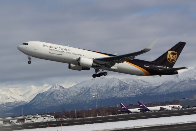 BOEING 767-300 (N349UP) - Takeoff viewed from west side of N-S runway along Pt. Woronzof Rd.