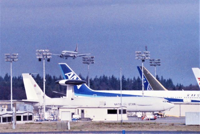 Boeing 707-100 (LXN90442) - KPAE Feb 1995 NATO AWACS on the ramp - unsure where this was built up at but 90442 was here the whole week I was in the Everett area visiting relatives. Soon to be Thai Royal Air Force Boeing 737-400 on final for a touch and go. I was extremely lucky to see that jet,