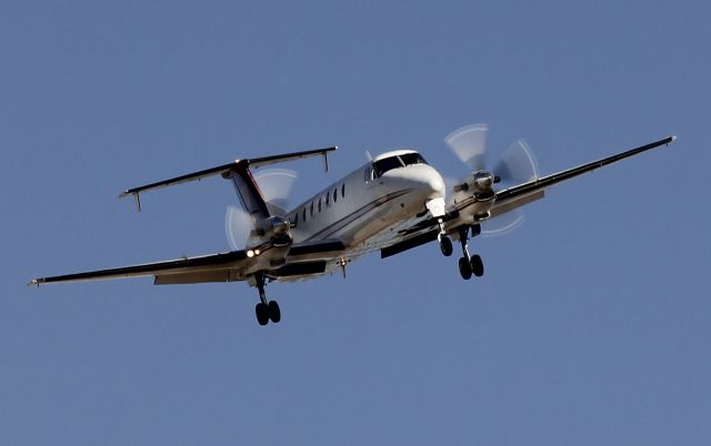 Beechcraft 1900 (C-GWWY) - A West Wind Aviation Beechcraft 1900C rolls onto short final in YXE.