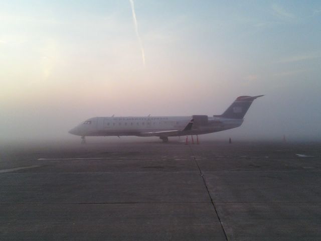 Canadair Regional Jet CRJ-200 — - One very foggy morning.