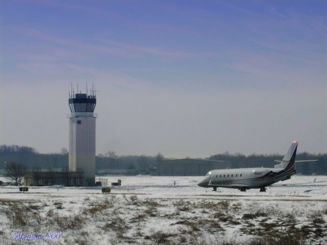 IAI Gulfstream G200 (N62GX) - Shown here in the winter of 2005 this Aircraft  will be taxiing by the control tower for this facility on its way to the main terminal.  The ATCs here assist the smallest of props, business jets and on occasions the smaller passenger Jets as they come and go.   Good Day.