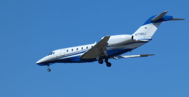 Cessna Citation X (N778XJ) - On short final is this 2007 Cessna Citation 750 in the Spring of 2022.