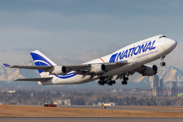 Boeing 747-400 (N756CA) - NCR519 lifts off runway 35L for PIT.