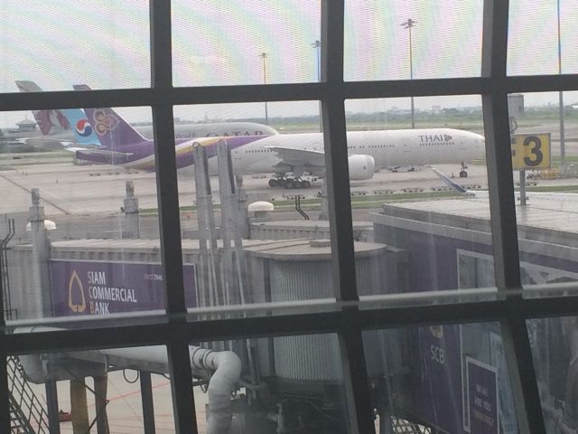 BOEING 777-300ER — - A Thai Airways International Boeing 777-300er as seen from my vantage point at Bangkok airport.